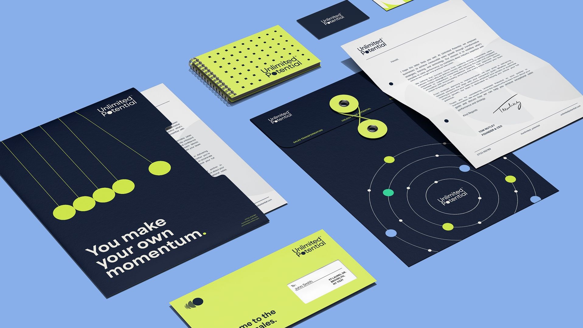 Unlimited Potential branded stationery collage including notebook, cards and envelope