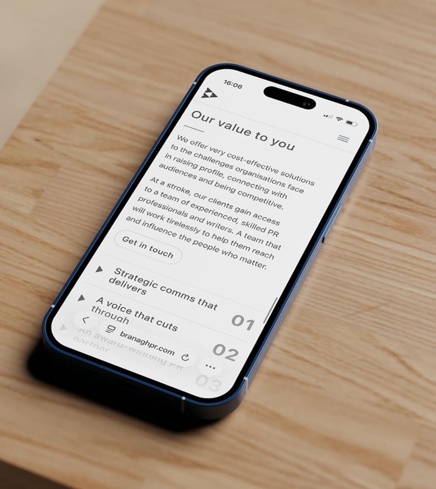 Branagh PR mobile website design shown on phone, by On Poynt Creative