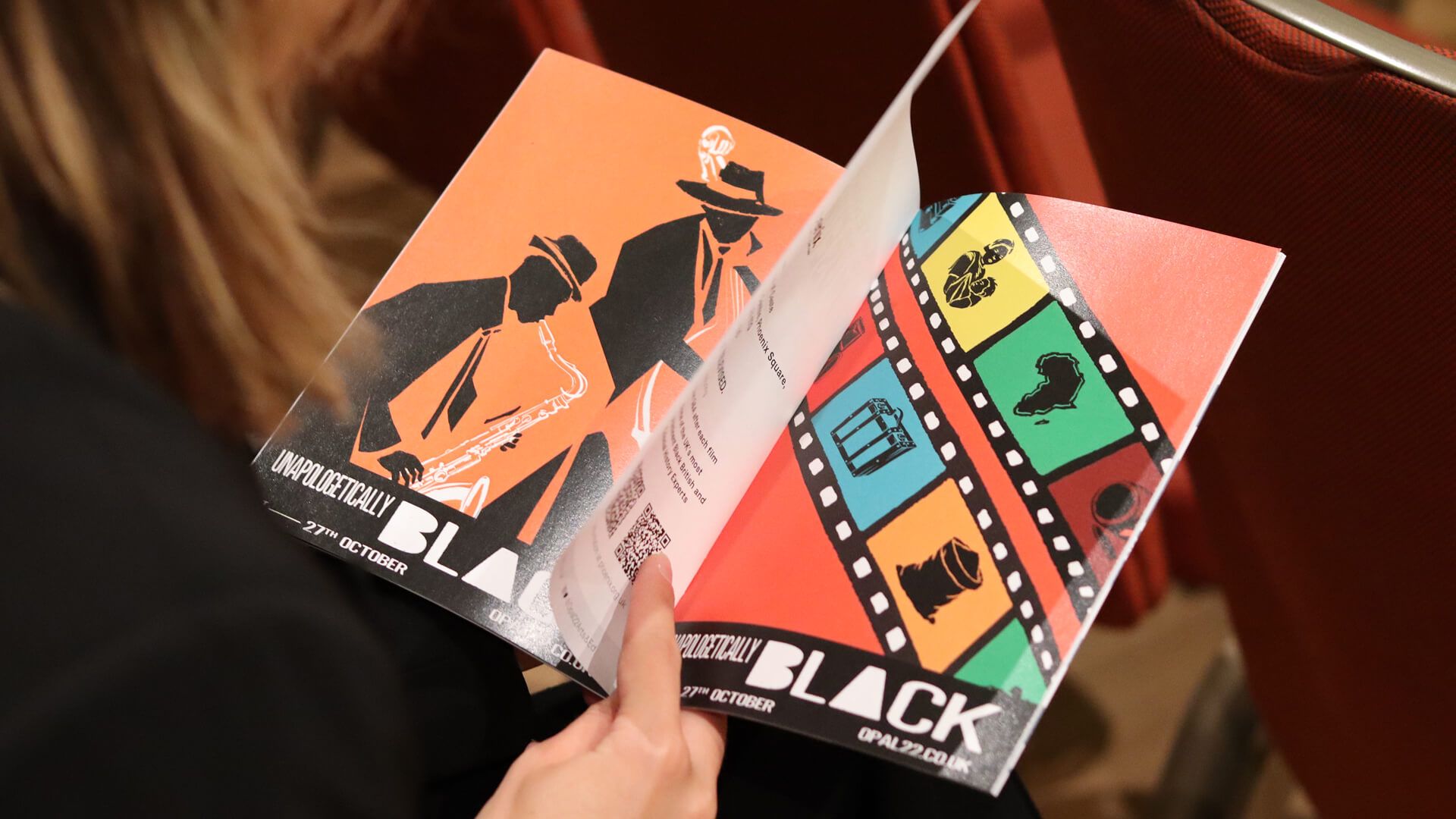Opal 22 film themed poster held in hand, by On Poynt Creative