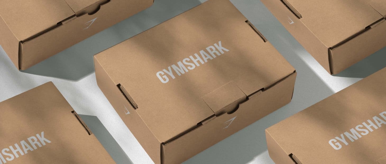 Branded packaging across boxes, labels and printed customer materials