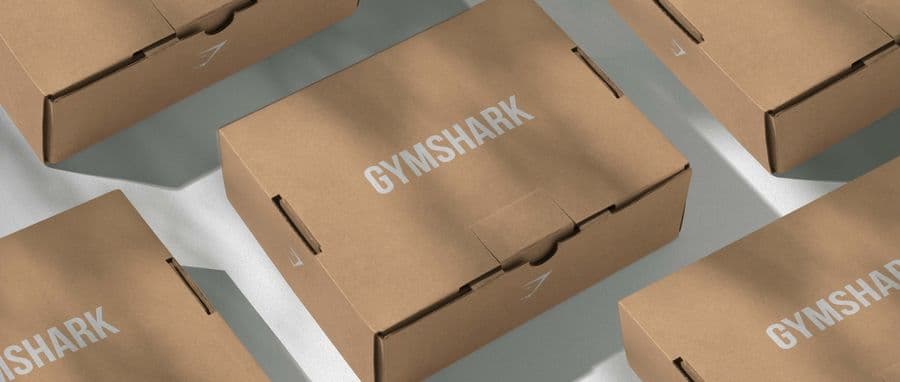 Branded packaging across boxes, labels and printed customer materials