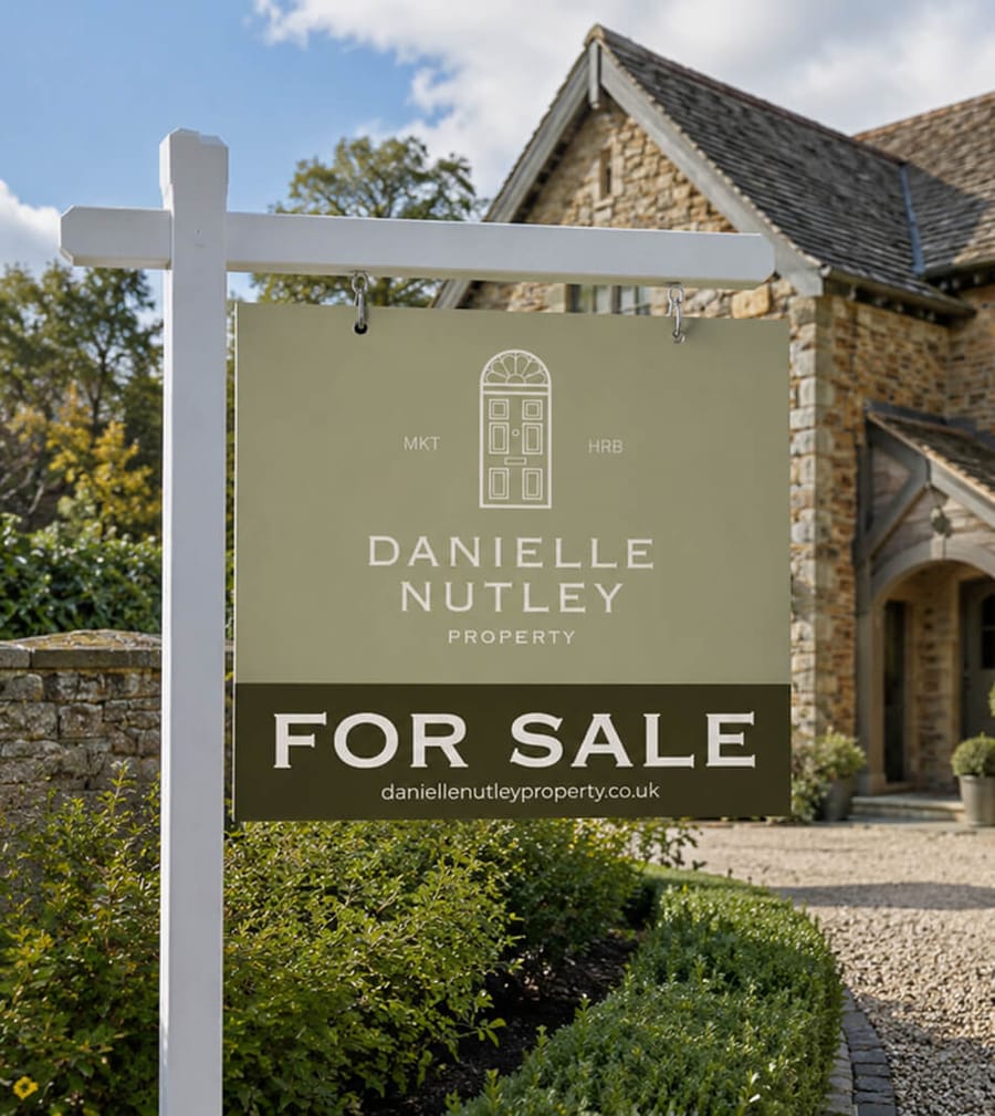 Danielle Nutley Properties For Sale board sign mockup outside stone cottage, estate agency brand design by On Poynt Creative