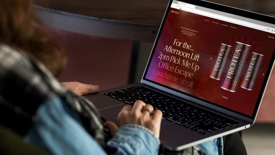 Protea website design displayed on laptop by On Poynt Creative